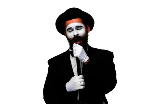 portrait of a man as mime with tube or retro style microphone isolated on white