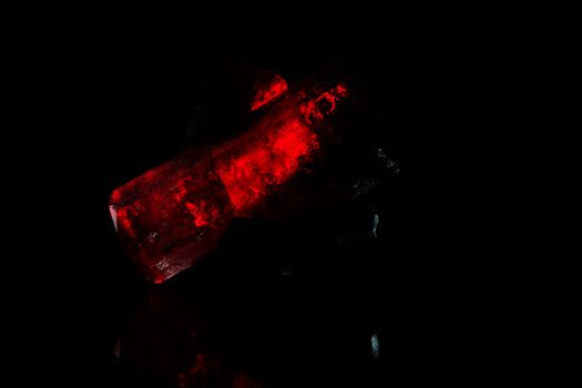 A macro photo of red glowing crystals.