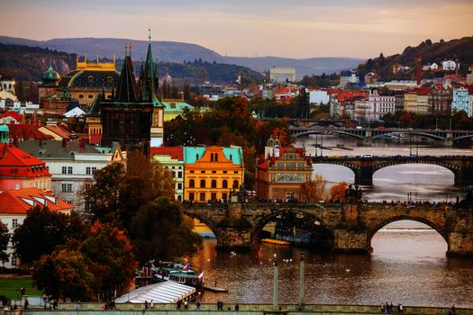 Overview of old Prague with Charles bridge before sunset