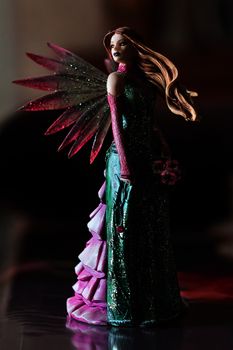 Toy fairy with wings and flowing hair