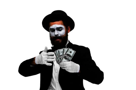 mime as businessman holding money isolated on a white background. concept  love of money and greed