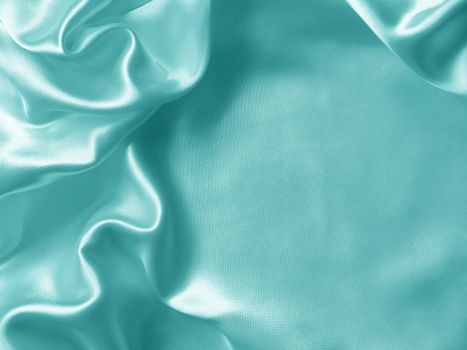 Smooth elegant blue silk or satin can use as background 