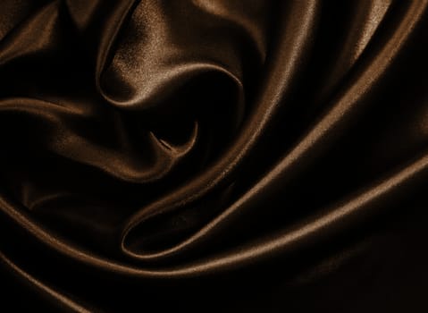 Smooth elegant golden silk or satin can use as background. In Sepia toned. Retro style