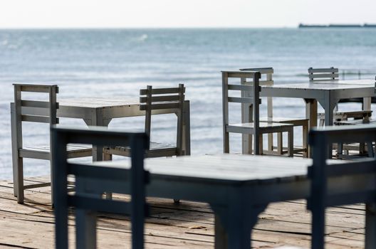 Wood dock White chair and table in Koh Samet Thailand