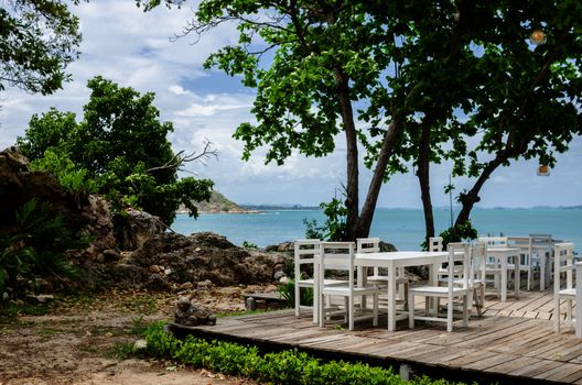 Wood dock White chair and table in Koh Samet Thailand