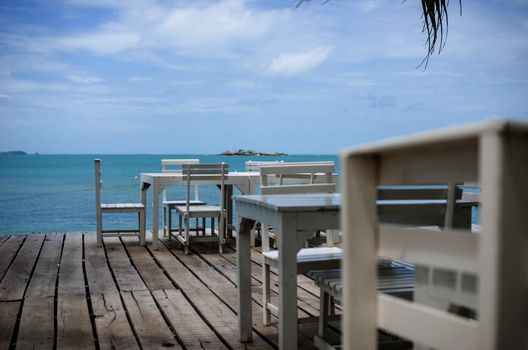 Wood dock White chair and table in Koh Samet Thailand