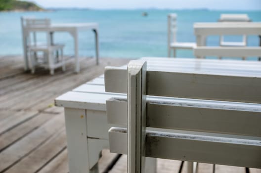 Wood dock White chair and table in Koh Samet Thailand
