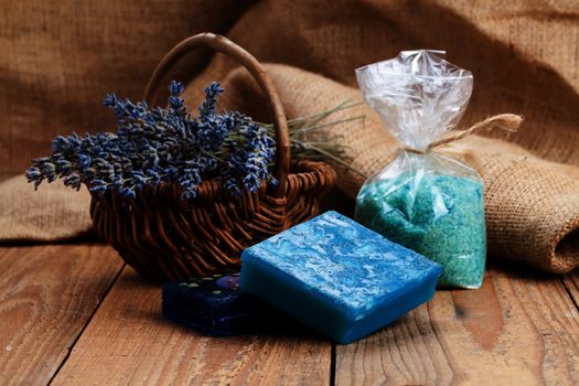 Homemade Soap with Lavender Flowers and Sea Salt, on wooden background