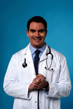 Male physician with stethoscope around his neck
