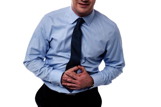 Cropped image of businessman suffering from stomach pain