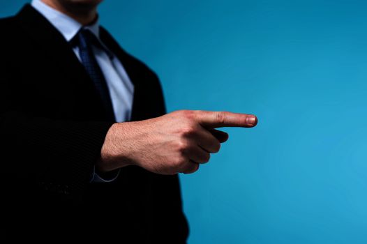 Cropped image of businessman pointing his finger