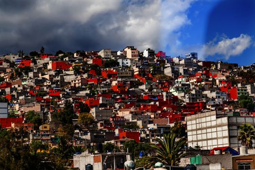 Colorful Orange Houses Suburbs, Outskirts Outside Rainstorm Mexico City Mexico  Colorful Orange Houses makes pattern.