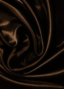 Smooth elegant golden silk or satin can use as background. In Sepia toned. Retro style