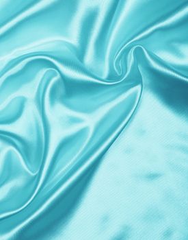 Smooth elegant blue silk or satin can use as background
