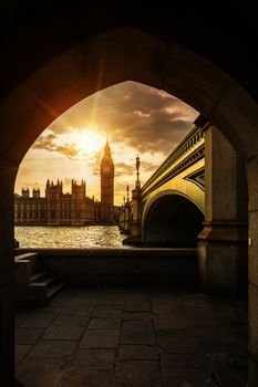 View of Big Ben through the pedestrian tunnel at sunset, London.