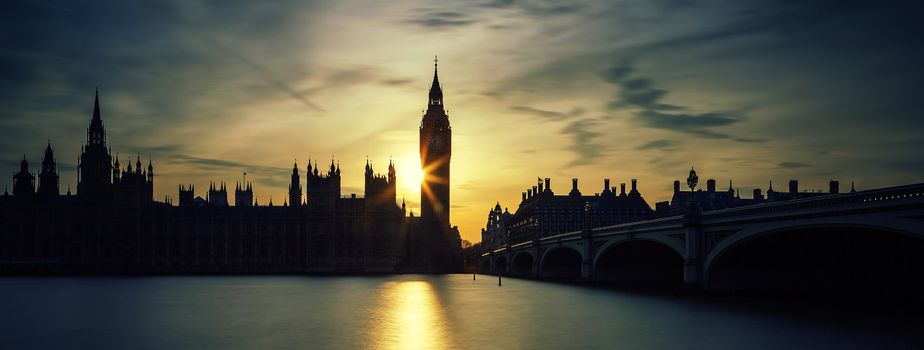 Panoramic view of Big Ben clock tower in London at sunset, UK. Special photographic processing.