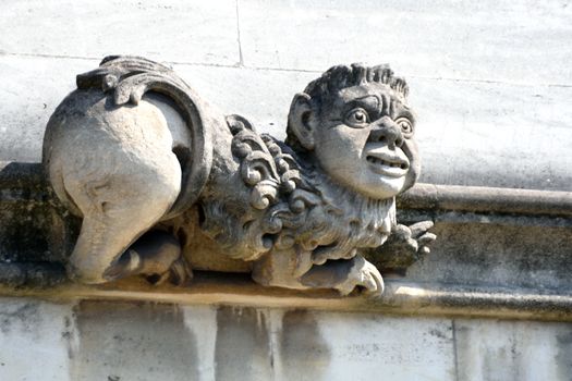 Stone gargoyle with funny face