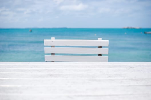 Wood dock White chair and table in Koh Samet Thailand