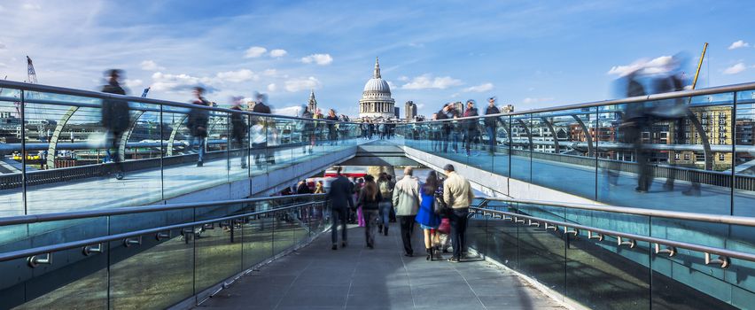 the Millennium footbridge looking towards St. Paul's Cathedral, panoramic view.
