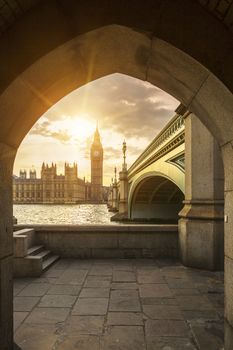 View of Big Ben through the pedestrian tunnel at sunset, London.