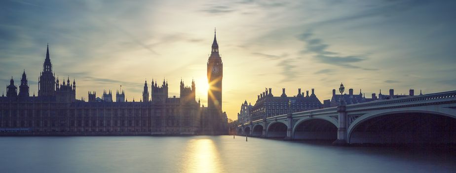 Panoramic view of Big Ben clock tower in London at sunset, UK. Special photographic processing.