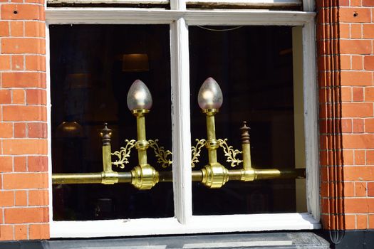 Elegant Brass lamps in window