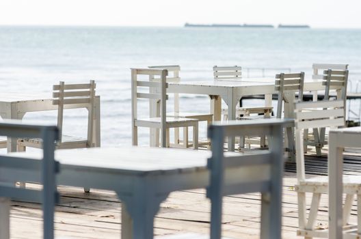 Wood dock White chair and table in Koh Samet Thailand