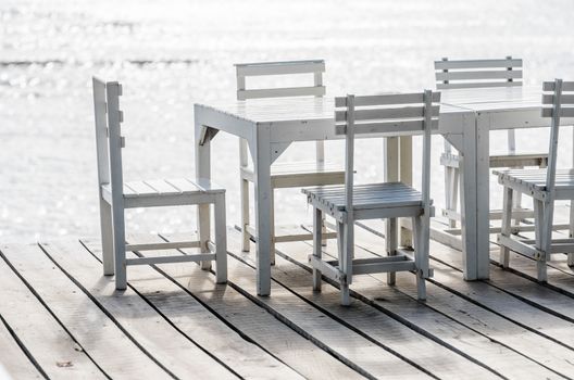 Wood dock White chair and table in Koh Samet Thailand