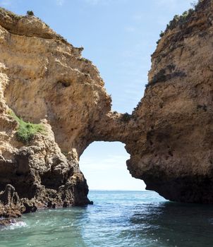 tow rocks like a natural bridge in the algarve portugal near lagos