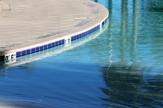 Also known as a "walk in" pool, this swimming pool doesn't have any steps.