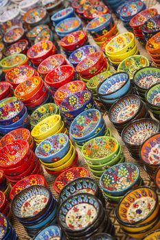 Beautiful Hand Painted Turkish Bowls on Table at the Market.