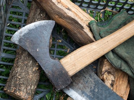 Old steel and wood Axe and splinters of wood