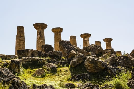 Ancient columns of Hercules Temple at Italy, Sicily, Agrigento. Greek Temples Valley.