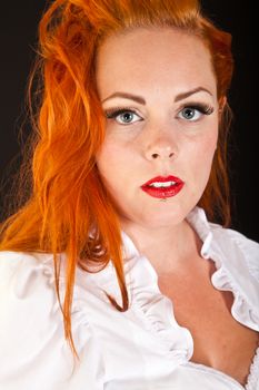 Red hair girl in pin-up style portrait