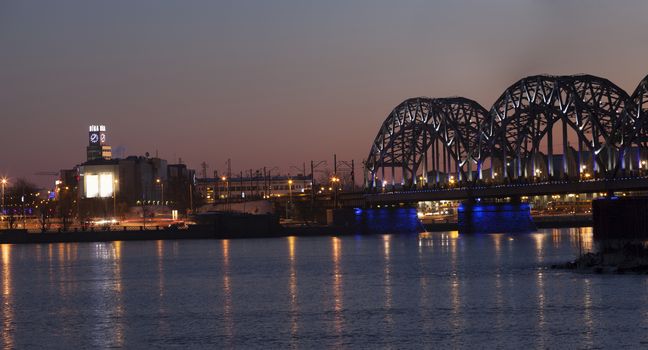 Riga Railway Bridge over river Daugava during dawn time
