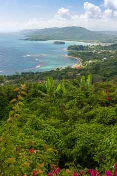 Jamaican Beach A. Caribbean white sand beach on the northern coast of Jamaica, near Dunn's River Falls and the town of Ocho Rios.