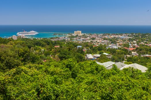 Jamaican Beach A. Caribbean beach on the northern coast of Jamaica, near Dunn's River Falls and the town of Ocho Rios.