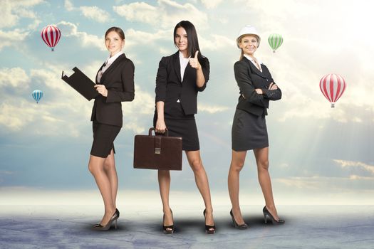 Young attractive business women looking at camera on abstract background