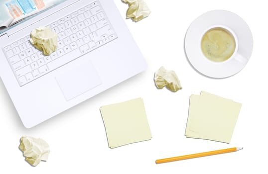 White laptop and crumpled piece of paper on isolated white background, top view. Closed up