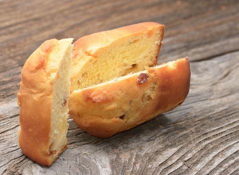 Sliced penatton cake on wooden background