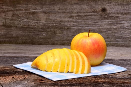 fresh apples on napkin wooden table