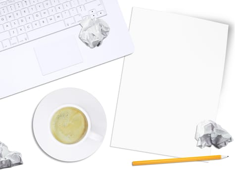 White laptop, crumpled paper with pencil,  and coffee cup on isolated white background, top view. Closed up