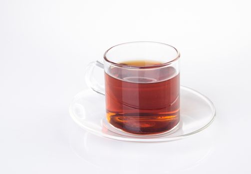 Tea in glass cup on a background. Tea in glass cup on a background.