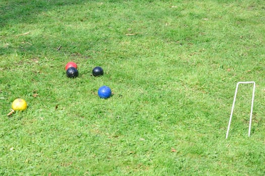 Croquet hoop with colored balls