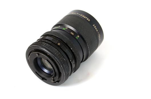 An Old Manual Control Camera Lens Isolated On White,Picture of a 