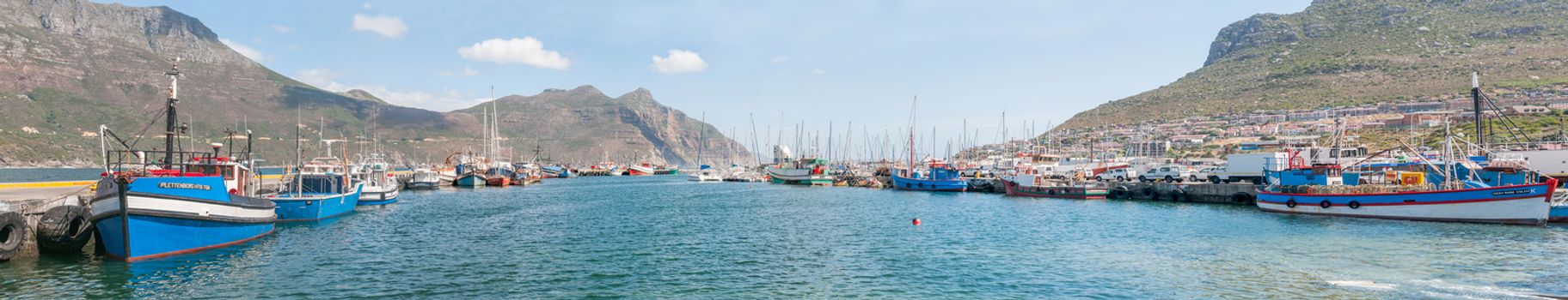 CAPE TOWN, SOUTH AFRICA - DECEMBER 12, 2014:  Panorama of Hout Bay harbor and part of the town