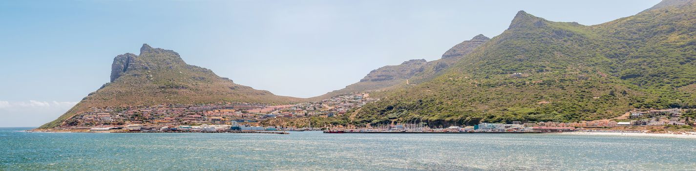 CAPE TOWN, SOUTH AFRICA - DECEMBER 12, 2014:  Panorama of Hout Bay as seen across the bay from the bronze leopard  sculpture