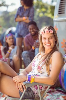 Carefree hipster having fun on campsite at a music festival 