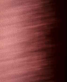 abstract background or texture shadow on the wall old pink colors