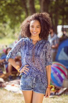 Pretty hipster posing for camera at a music festival 